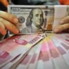 Rupiah Melemah ke Rp18.099 per Dolar AS, Dipicu Ketegangan Timur Tengah dan Sentimen The Fed